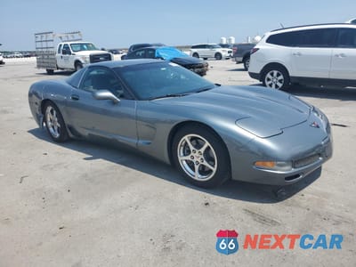 Czwarte zdjęcie samochodu z boku: 2004 CHEVROLET CORVETTE VIN:1G1YY22G845109082 - miniatura