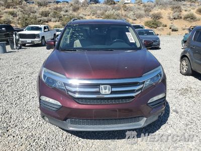 Piąte zdjęcie samochodu w środku: 2017 HONDA PILOT TOURING VIN:5FNYF6H97HB009136 - miniatura