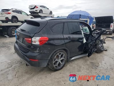 Trzecie zdjęcie samochodu z tyłu: 2017 BMW X1 SDRIVE28I VIN:WBXHU7C35H5H38032 - miniatura