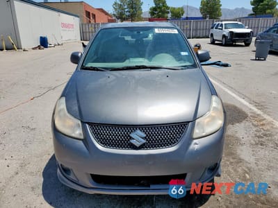 Piąte zdjęcie samochodu w środku: 2010 SUZUKI SX4 SPORT VIN:JS2YC5A42A6300135 - miniatura