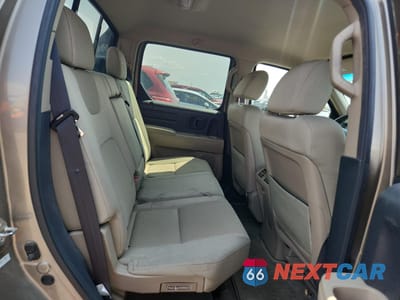Zdjęcie 10 z 13 samochodu: 2010 HONDA RIDGELINE RTS VIN:5FPYK1F4XAB009800 - miniatura