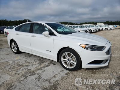 Czwarte zdjęcie samochodu z boku: 2018 FORD FUSION SE HYBRID VIN:3FA6P0LU6JR278719 - miniatura