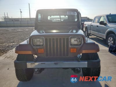 Piąte zdjęcie samochodu w środku: 1987 JEEP WRANGLER LAREDO VIN:2BCCL8143HB514067 - miniatura