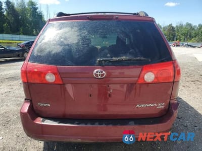 Zdjęcie 6 z 13 samochodu: 2010 TOYOTA SIENNA XLE VIN:5TDDK4CC1AS030664 - miniatura