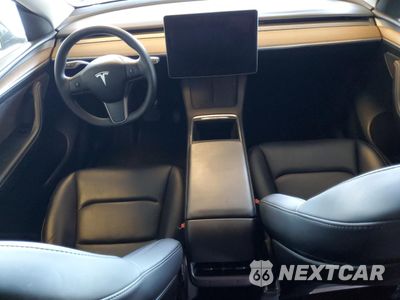 Zdjęcie 8 z 13 samochodu: 2023 TESLA MODEL Y VIN:7SAYGDEE4PF620455 - miniatura