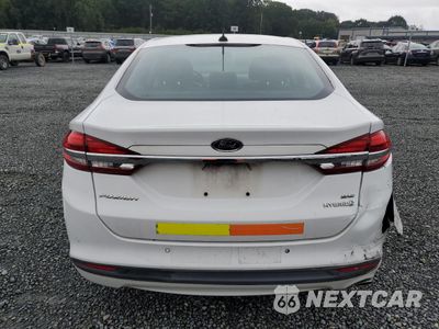 Zdjęcie 6 z 12 samochodu: 2018 FORD FUSION SE HYBRID VIN:3FA6P0LU8JR118860 - miniatura