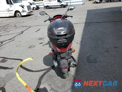 Czwarte zdjęcie samochodu z boku: 2013 HONDA PCX 150 VIN:MLHKF1213D5004746 - miniatura