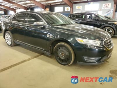 Czwarte zdjęcie samochodu z boku: 2014 FORD TAURUS LIMITED VIN:1FAHP2F80EG100529 - miniatura