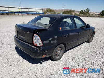 Trzecie zdjęcie samochodu z tyłu: 2003 HYUNDAI ACCENT GL VIN:KMHCG45C43U465134 - miniatura