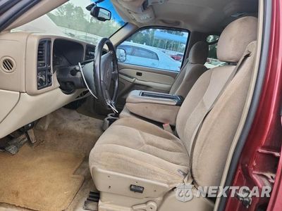 Zdjęcie 13 z 26 samochodu: 2003 CHEVROLET SUBURBAN C1500 VIN:1GNEC16Z43J265664 - miniatura