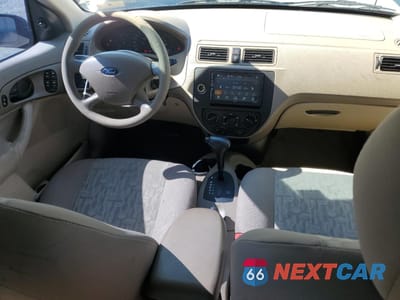 Zdjęcie 8 z 14 samochodu: 2005 FORD FOCUS ZX4 VIN:1FAHP34N05W110059 - miniatura