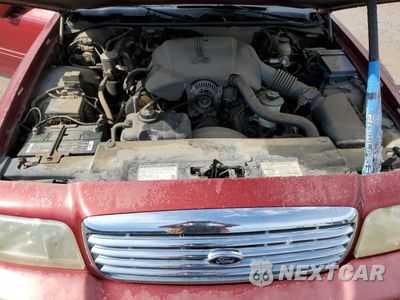 Zdjęcie 11 z 14 samochodu: 2000 FORD CROWN VICTORIA LX VIN:2FAFP74W4YX100974 - miniatura