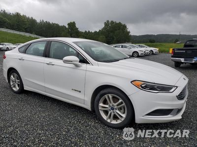 Czwarte zdjęcie samochodu z boku: 2018 FORD FUSION SE HYBRID VIN:3FA6P0LU1JR118845 - miniatura