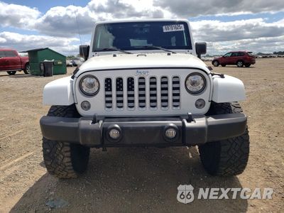 Piąte zdjęcie samochodu w środku: 2017 JEEP WRANGLER UNLIMITED SAHARA VIN:1C4HJWEG3HL537769 - miniatura