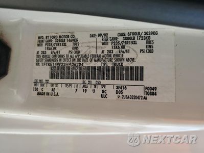 Zdjęcie 13 z 13 samochodu: 2003 FORD ECONOLINE E150 VAN VIN:1FTRE14W33HA36204 - miniatura