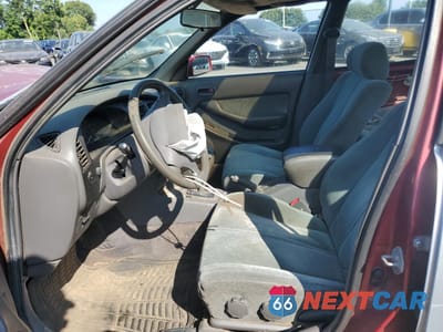 Zdjęcie 7 z 13 samochodu: 1993 TOYOTA CAMRY LE VIN:JT2SK12E9P0109934 - miniatura