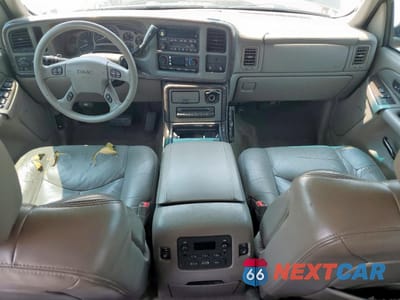 Zdjęcie 8 z 13 samochodu: 2004 GMC YUKON XL DENALI VIN:1GKFK66U14J266178 - miniatura