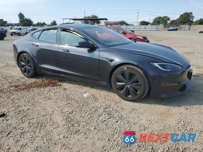 Czwarte zdjęcie samochodu z boku: 2023 TESLA MODEL S VIN:5YJSA1E51PF529257 - miniatura