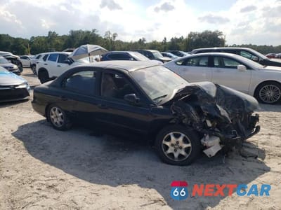 Czwarte zdjęcie samochodu z boku: 2001 HYUNDAI SONATA GLS VIN:KMHWF35V11A429427 - miniatura