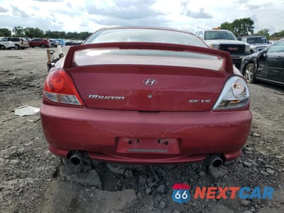 Zdjęcie 6 z 12 samochodu: 2005 HYUNDAI TIBURON GT VIN:KMHHN65F25U160235 - miniatura