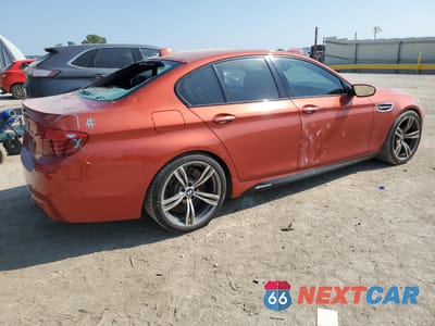 Trzecie zdjęcie samochodu z tyłu: 2014 BMW M5 VIN:WBSFV9C52ED593702 - miniatura