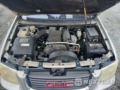 Zdjęcie 12 z 14 samochodu: 2004 GMC ENVOY XUV VIN:1GKES12SX46176856 - miniatura
