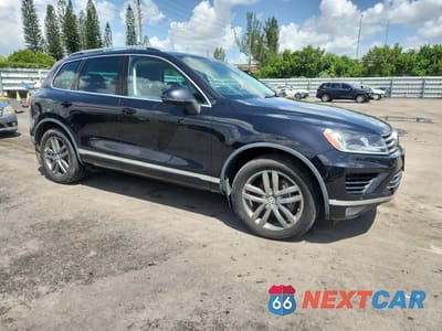 Czwarte zdjęcie samochodu z boku: 2015 VOLKSWAGEN TOUAREG V6 TDI VIN:WVGEP9BP8FD003287 - miniatura
