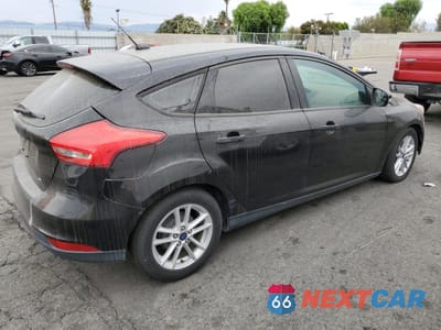 Trzecie zdjęcie samochodu z tyłu: 2017 FORD FOCUS SE VIN:1FADP3K21HL278287 - miniatura