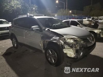 Czwarte zdjęcie samochodu z boku: 2015 TOYOTA RAV4 XLE VIN:2T3WFREV8FW143672 - miniatura