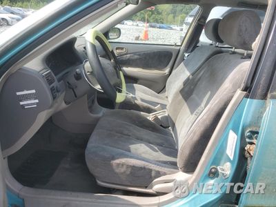 Zdjęcie 7 z 12 samochodu: 1999 TOYOTA COROLLA VE VIN:1NXBR12E7XZ186275 - miniatura
