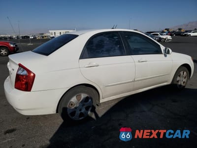 Trzecie zdjęcie samochodu z tyłu: 2006 KIA SPECTRA LX VIN:KNAFE121165239573 - miniatura