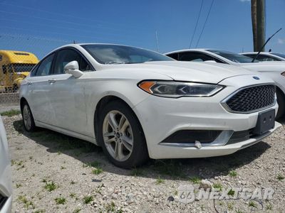 Czwarte zdjęcie samochodu z boku: 2018 FORD FUSION SE HYBRID VIN:3FA6P0LU1JR118599 - miniatura
