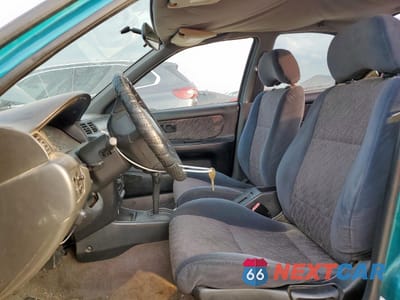 Zdjęcie 7 z 12 samochodu: 1999 NISSAN SENTRA BASE VIN:1N4AB41D4XC717507 - miniatura