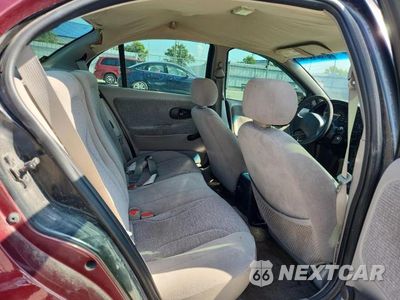 Zdjęcie 10 z 13 samochodu: 2002 SATURN SL1 VIN:1G8ZH52842Z312766 - miniatura