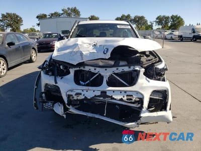 Piąte zdjęcie samochodu w środku: 2021 BMW X3 XDRIVE30E VIN:5UXTS1C02M9D96766 - miniatura
