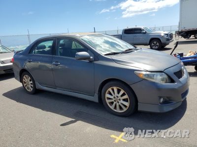 Czwarte zdjęcie samochodu z boku: 2010 TOYOTA COROLLA BASE VIN:1NXBU4EE7AZ372675 - miniatura