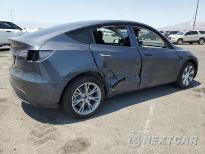 Trzecie zdjęcie samochodu z tyłu: 2023 TESLA MODEL Y VIN:7SAYGDEE5PF920182 - miniatura