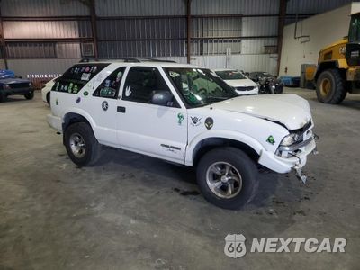 Czwarte zdjęcie samochodu z boku: 2003 CHEVROLET BLAZER VIN:1GNCS18X63K137572 - miniatura