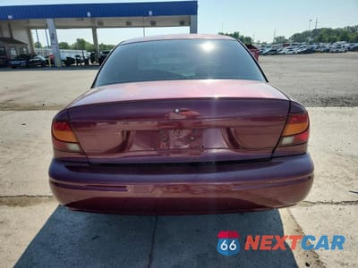Zdjęcie 6 z 13 samochodu: 2002 SATURN SL1 VIN:1G8ZH52842Z312766 - miniatura