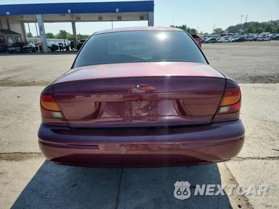 Zdjęcie 6 z 13 samochodu: 2002 SATURN SL1 VIN:1G8ZH52842Z312766 - miniatura