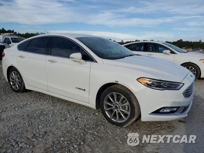 Czwarte zdjęcie samochodu z boku: 2017 FORD FUSION SE HYBRID VIN:3FA6P0LU4HR400715 - miniatura