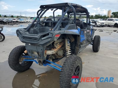 Czwarte zdjęcie samochodu z boku: 2021 POLARIS RZR XP 4 TURBO S VELOCITY VIN:3NSP4E924MG609421 - miniatura