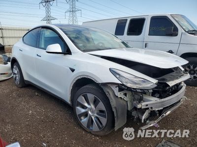 Czwarte zdjęcie samochodu z boku: 2023 TESLA MODEL Y VIN:7SAYGDEE5PA054268 - miniatura