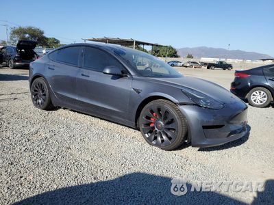 Czwarte zdjęcie samochodu z boku: 2023 TESLA MODEL 3 VIN:5YJ3E1EC3PF578273 - miniatura