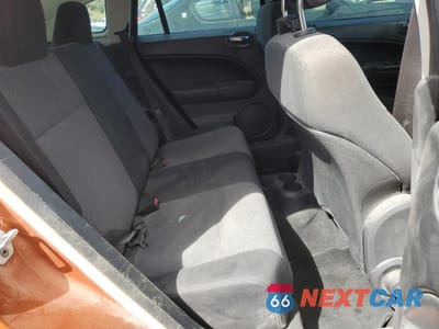 Zdjęcie 10 z 13 samochodu: 2011 DODGE CALIBER MAINSTREET VIN:1B3CB3HA6BD294443 - miniatura