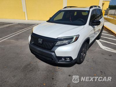 Drugie zdjęcie samochodu z przodu: 2021 HONDA PASSPORT TOURING VIN:5FNYF7H9XMB009275 - miniatura