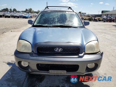 Piąte zdjęcie samochodu w środku: 2002 HYUNDAI SANTA FE GLS VIN:KM8SC13D92U218496 - miniatura