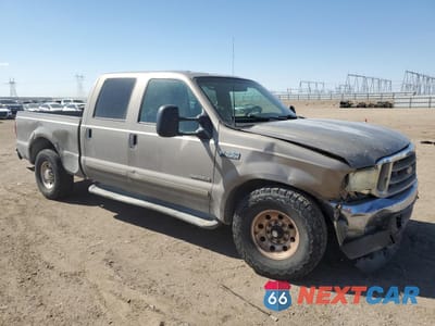 Czwarte zdjęcie samochodu z boku: 2002 FORD F250 SUPER DUTY VIN:1FTNW20F52EA88442 - miniatura