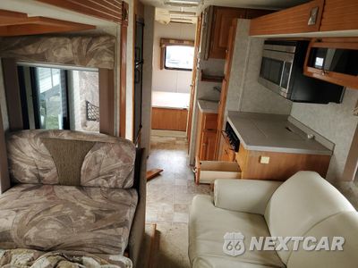 Zdjęcie 10 z 12 samochodu: 2005 FORD ECONOLINE E450 SUPER DUTY CUTAWAY VAN VIN:1FDXE45S65HA75095 - miniatura