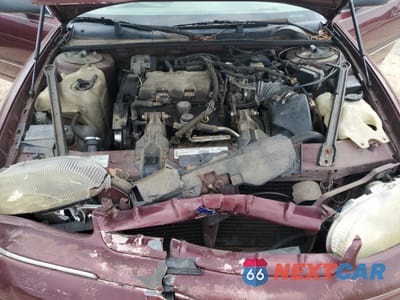 Zdjęcie 11 z 14 samochodu: 2001 CHEVROLET LUMINA VIN:2G1WL52J011254665 - miniatura